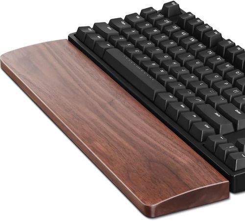 Sleek brown wood wrist rest for a keyboard