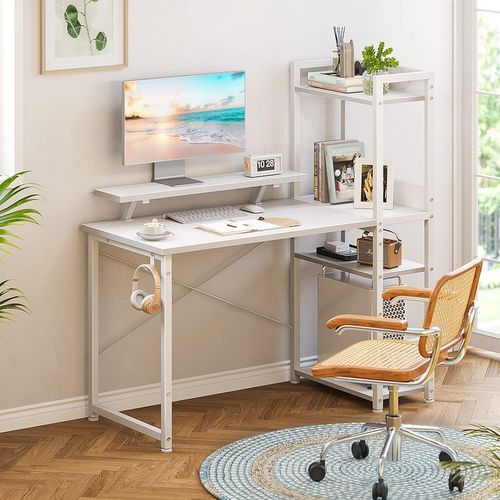 White table with  a monitor riser and storage on the right side of the table.