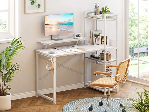 White table with  a monitor riser and storage on the right side of the table.