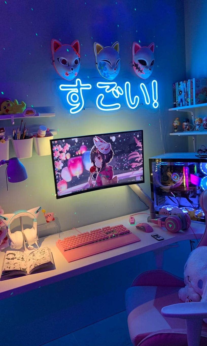 Kawaii pink gaming desk setup with neon lights